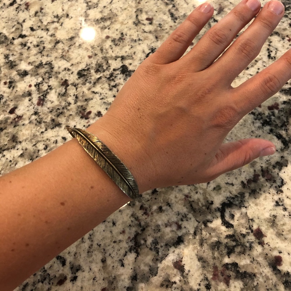 Gold feather detail Alex and Ani bracelet